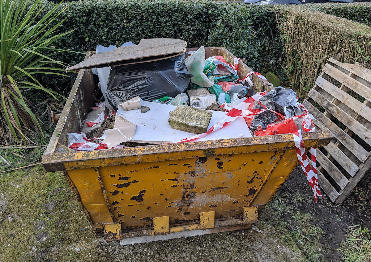 skip filled with rubbish